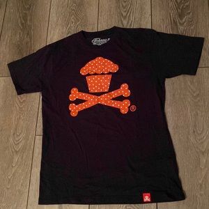 Large dark blue Johnny Cupcakes with Red “Starry” cupcake crossbone
